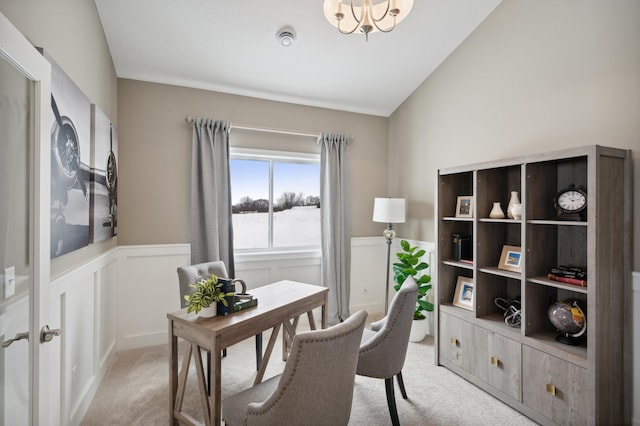 office with light carpet and vaulted ceiling