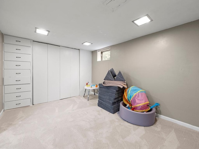 playroom with light colored carpet