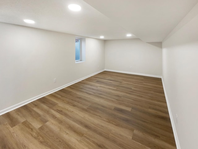 basement featuring dark wood-type flooring