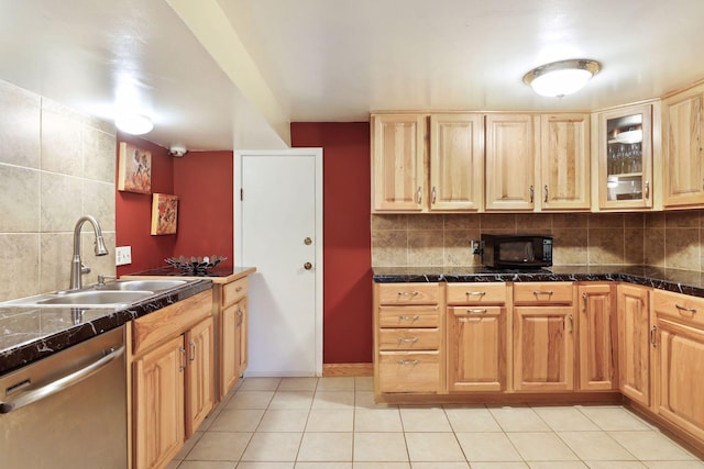 kitchen featuring light tile patterned flooring, backsplash, stainless steel dishwasher, and sink