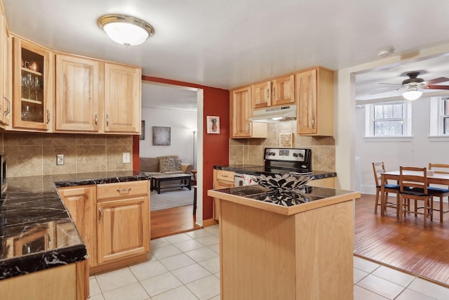 kitchen with ceiling fan, light brown cabinets, stainless steel range with electric cooktop, and light tile patterned flooring