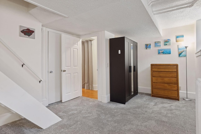 interior space with a textured ceiling