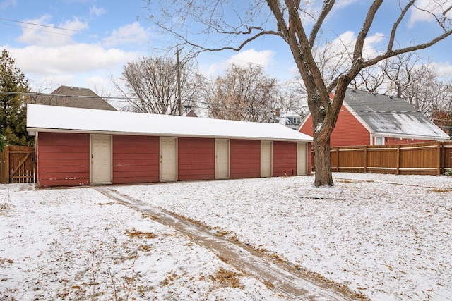 view of snow covered garage