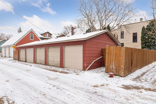 view of snow covered garage