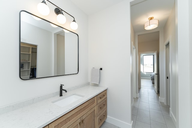 bathroom featuring vanity and tile patterned flooring