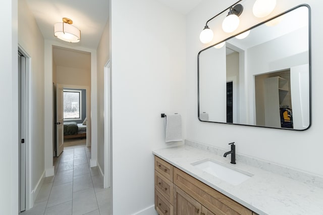 bathroom featuring vanity and tile patterned flooring