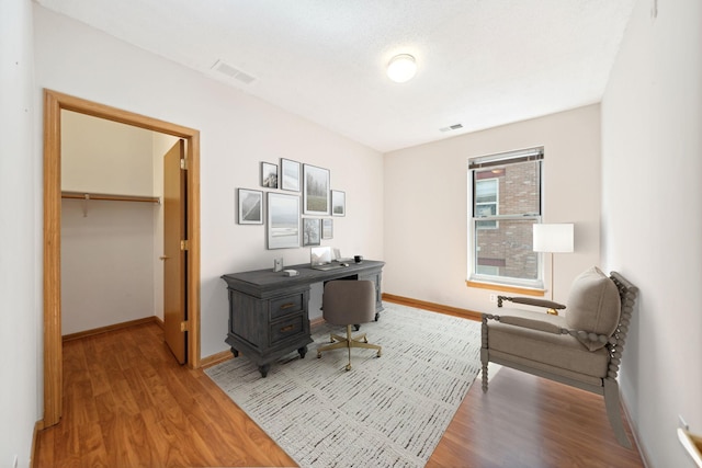 office space featuring wood-type flooring