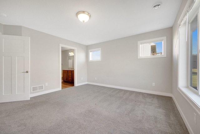 view of carpeted spare room