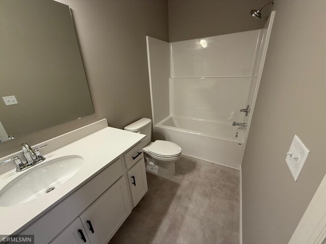 full bathroom with bathtub / shower combination, vanity, and toilet