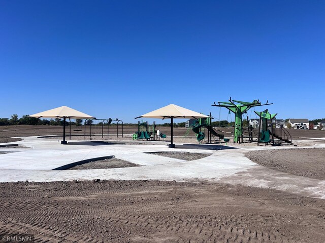 view of property's community featuring a playground