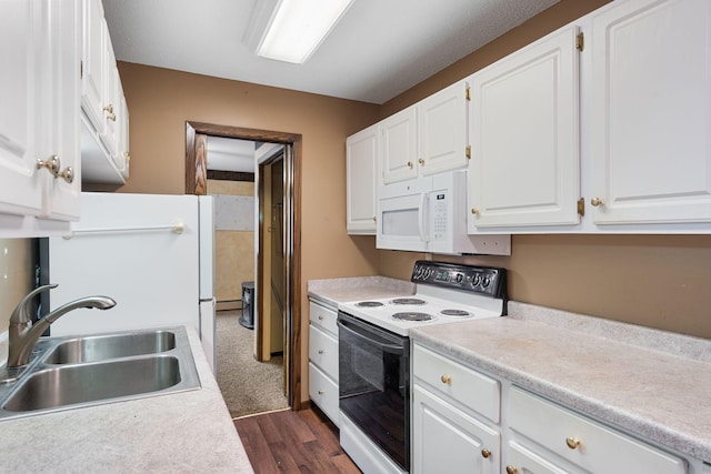 kitchen with range with electric cooktop, sink, dark hardwood / wood-style flooring, a baseboard heating unit, and white cabinets