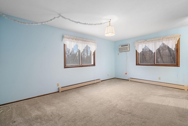 empty room featuring carpet floors, a baseboard radiator, and a wall unit AC