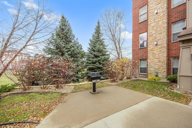 view of property's community with a patio