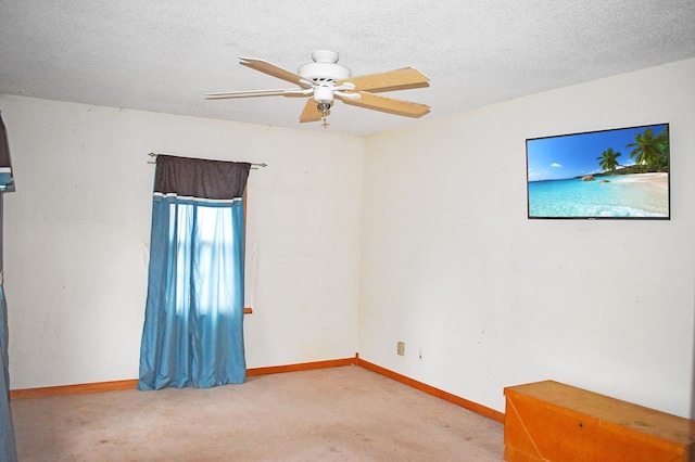 132 6th St NE, Crosby, MN 56441 - unfurnished room featuring carpet flooring, baseboards, a ceiling fan, and a textured ceiling