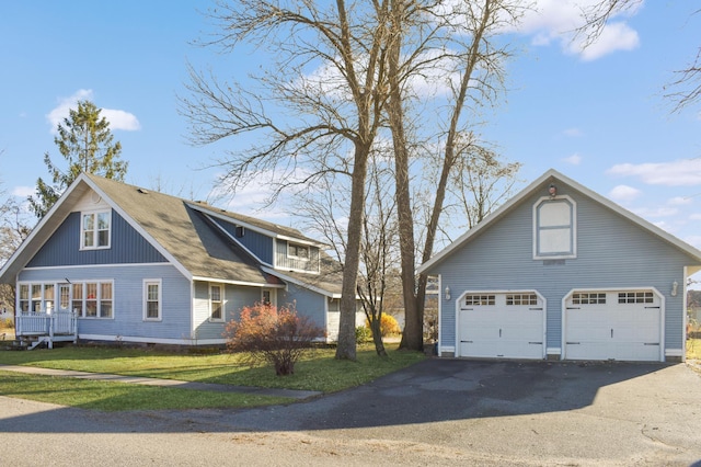 view of home's exterior featuring a lawn and a garage