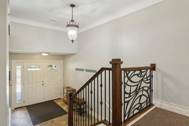 entrance foyer featuring visible vents and baseboards