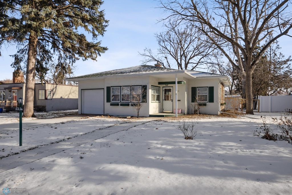 view of front of home featuring a garage