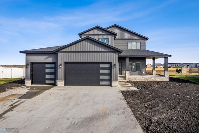 view of front of property featuring a garage