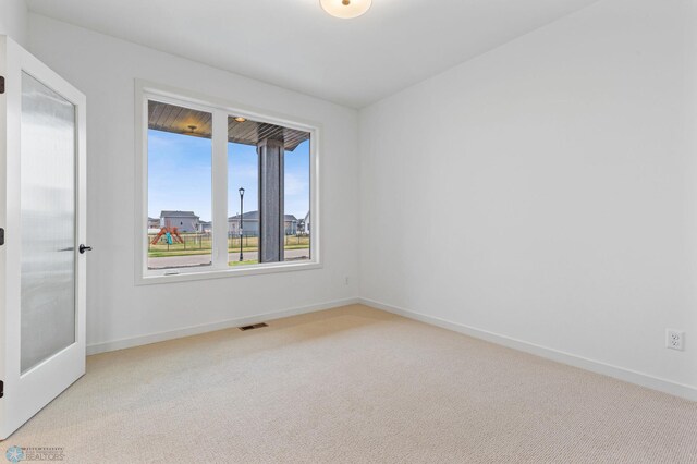 empty room with light carpet