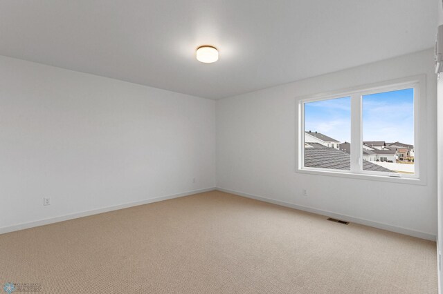 empty room featuring carpet