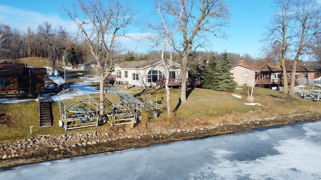 view of front of property with a water view