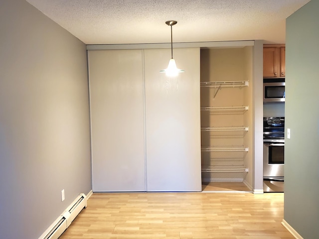 4110 Rahn Rd Unit 215, Eagan, MN 55122 - closet featuring baseboard heating