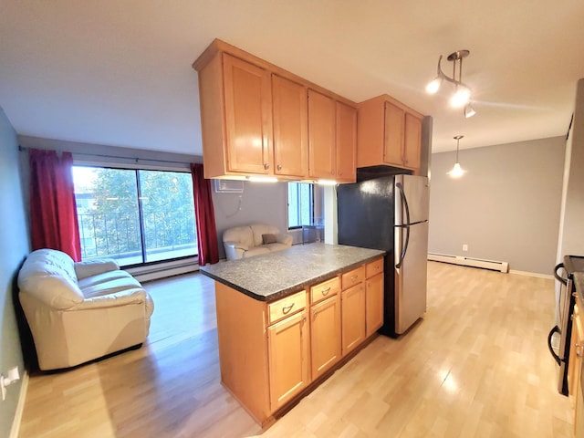4110 Rahn Rd Unit 215, Eagan, MN 55122 - kitchen featuring a baseboard radiator, freestanding refrigerator, and light wood-type flooring