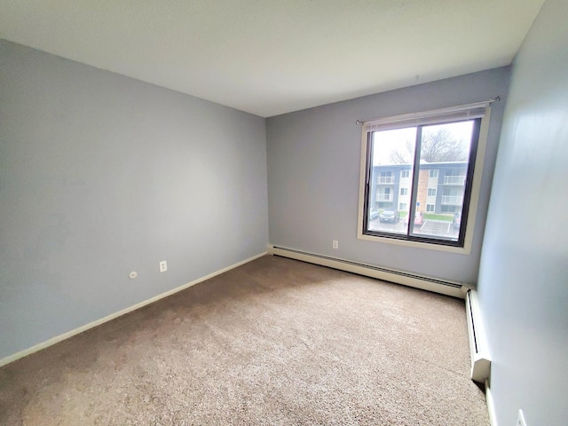 4110 Rahn Rd Unit 215, Eagan, MN 55122 - spare room featuring baseboard heating, carpet floors, and baseboards