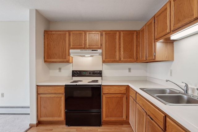 kitchen with light hardwood / wood-style floors, white electric range, sink, and a baseboard heating unit