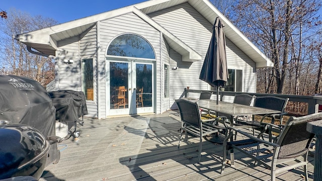 wooden deck featuring french doors