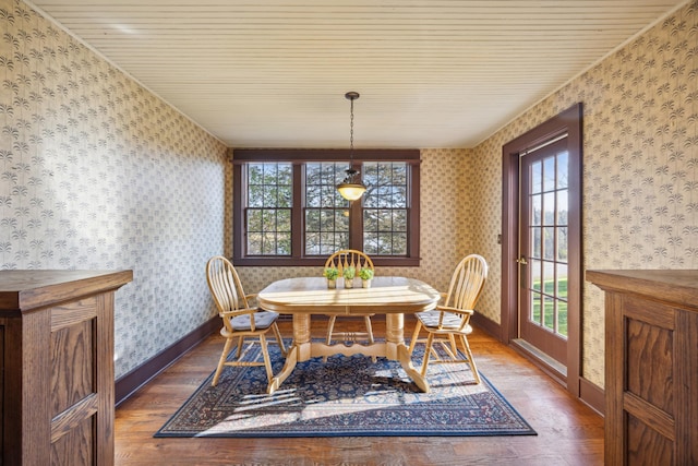 dining area featuring dark hardwood / wood-style flooring and a wealth of natural light