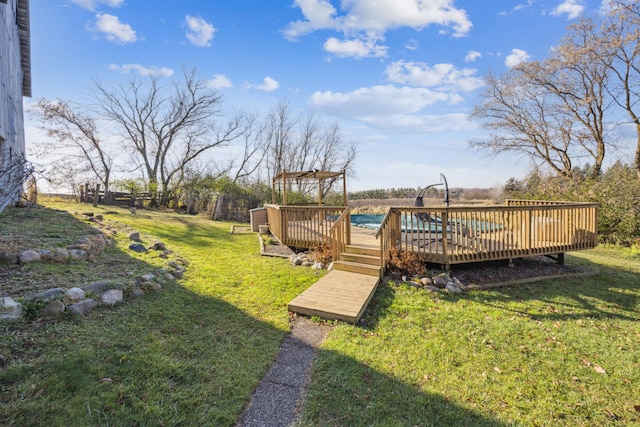 view of yard with a wooden deck