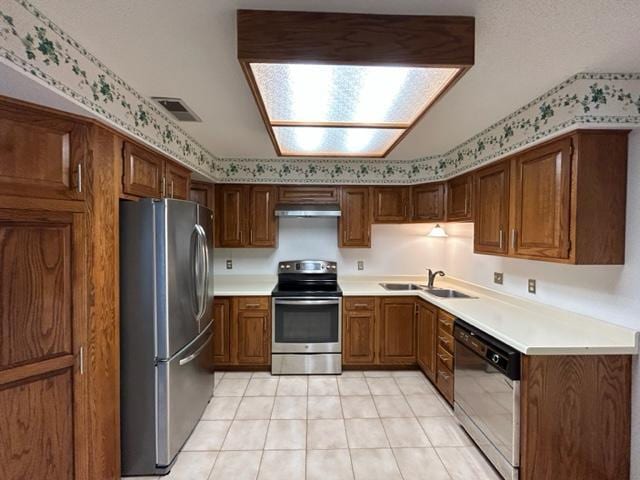 kitchen with sink and stainless steel appliances