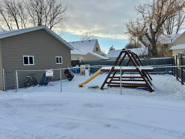 view of snow covered playground