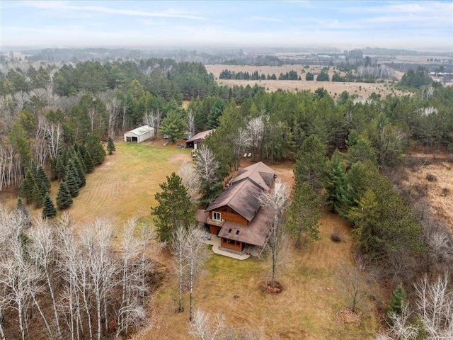 birds eye view of property with a rural view