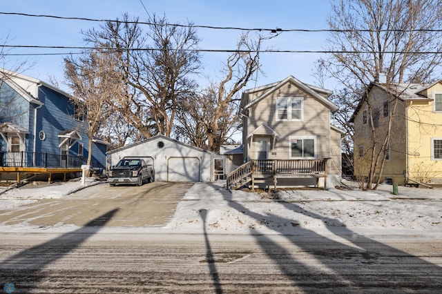 view of front of property with an outbuilding and a garage