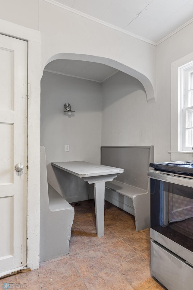 dining room with crown molding