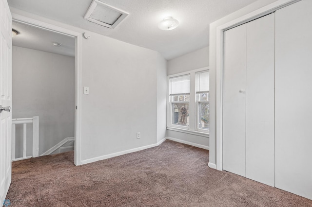 unfurnished bedroom with carpet floors