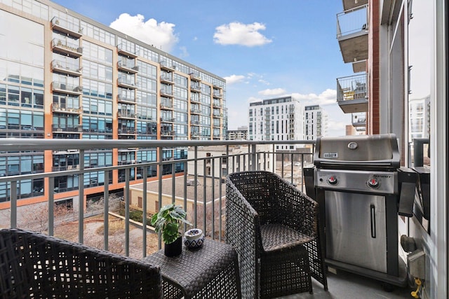 balcony featuring area for grilling