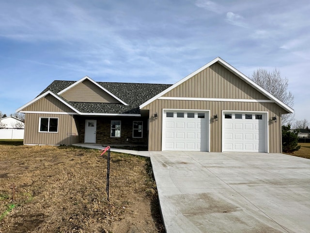 ranch-style house featuring a garage