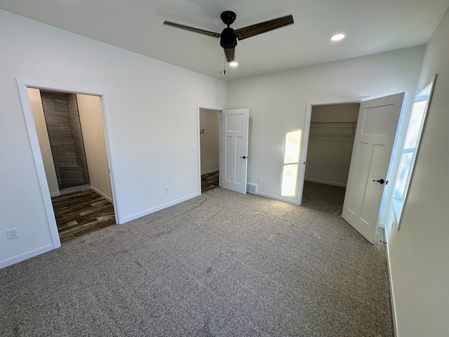 unfurnished bedroom featuring multiple windows, ceiling fan, a closet, and carpet