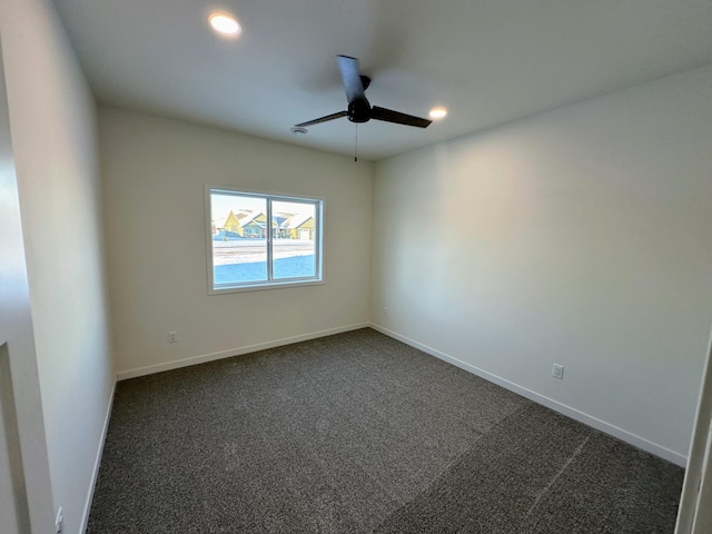 carpeted empty room with ceiling fan