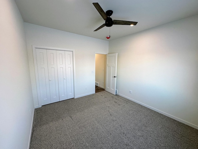 unfurnished bedroom featuring carpet flooring, a closet, and ceiling fan