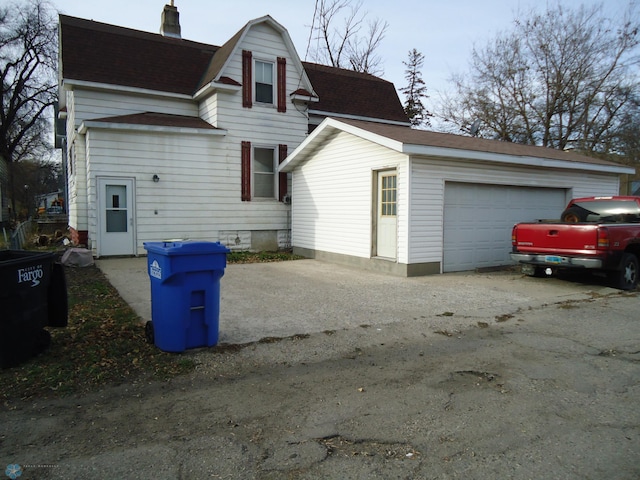 exterior space with a garage