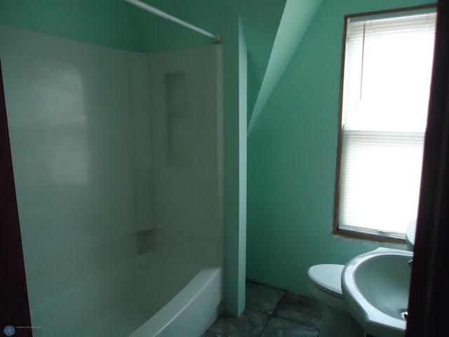 full bathroom with tile patterned floors, toilet, sink, and bathtub / shower combination