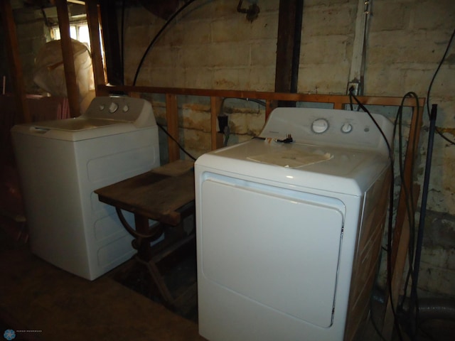 washroom featuring washer and dryer