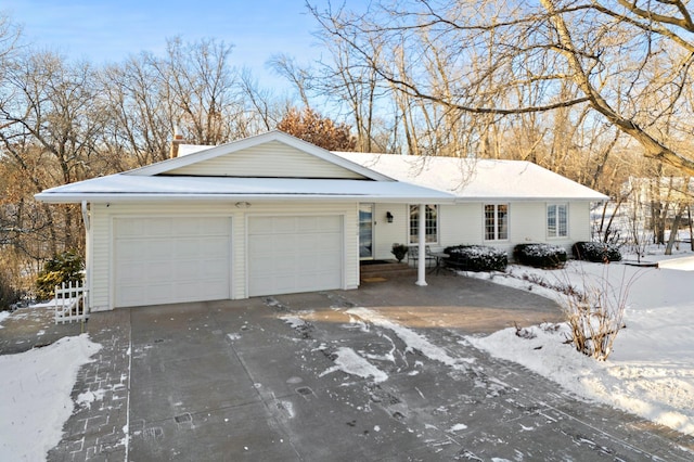 single story home featuring a garage