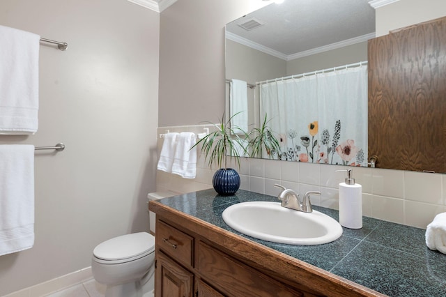 bathroom with tile patterned flooring, toilet, decorative backsplash, vanity, and crown molding