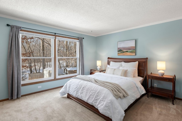 carpeted bedroom with a textured ceiling and ornamental molding