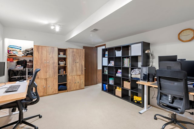 office space with light colored carpet